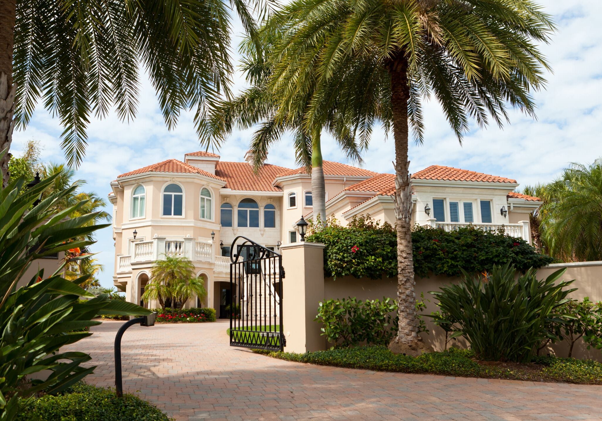 Elegant mansion with gated entrance by 911 Property Services
